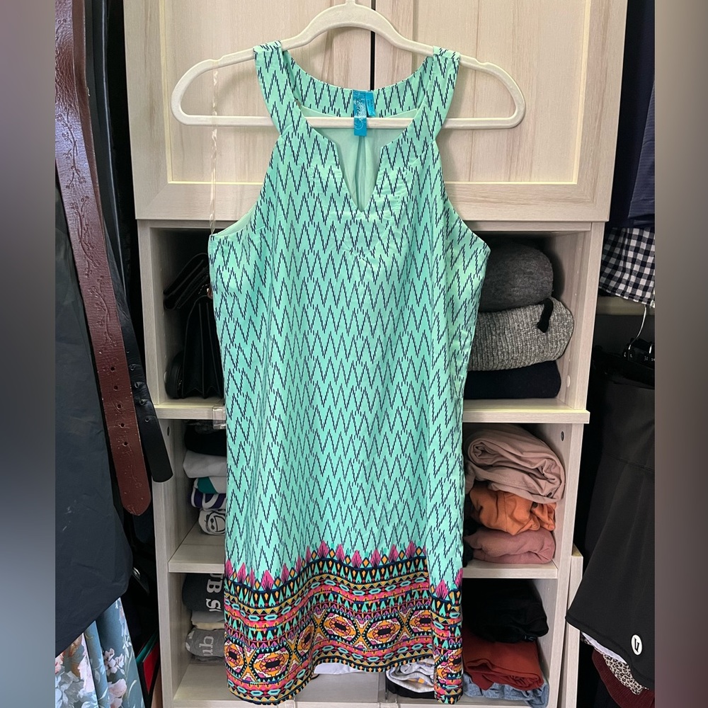 Francesca’s turquoise pattern dress